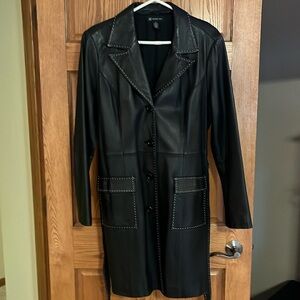 Black leather long jacket with white stitching. Size XL.